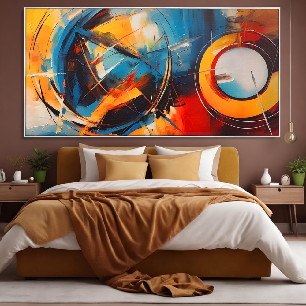 Tablou canvas cu pictura abstracta cu cercuri si linii, in rama de aluminiu argintiu, pe perete intr-un dormitor